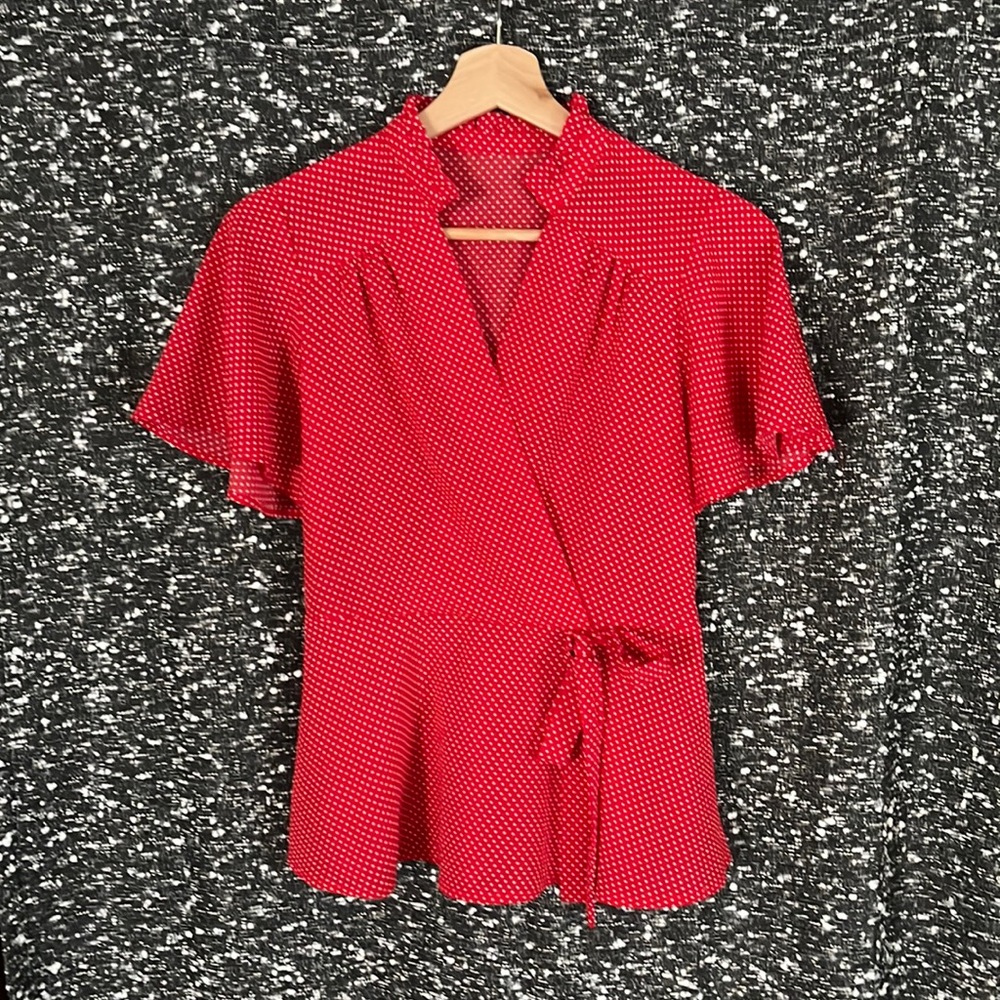 Very sweet, vintage small red and white polka dotted blouse.